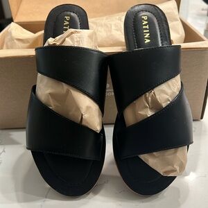 Portland Leather-Patina black double swirl slide sandal.